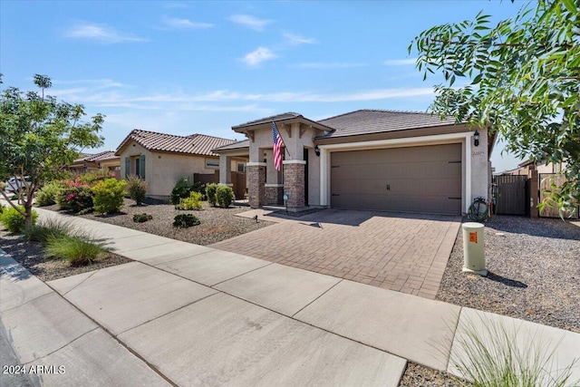 prairie-style home featuring a garage