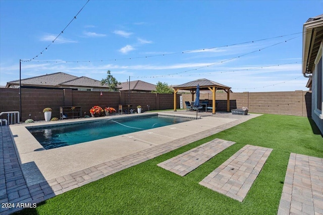 view of swimming pool with a gazebo, a yard, and a patio