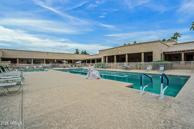 view of swimming pool featuring a patio