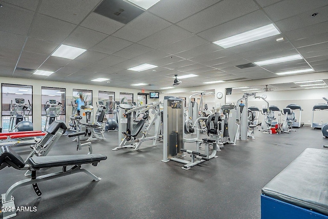 workout area with a drop ceiling