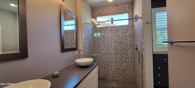 bathroom featuring vanity and walk in shower