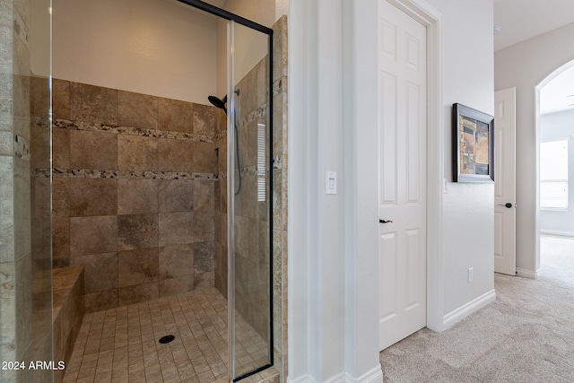 bathroom featuring walk in shower