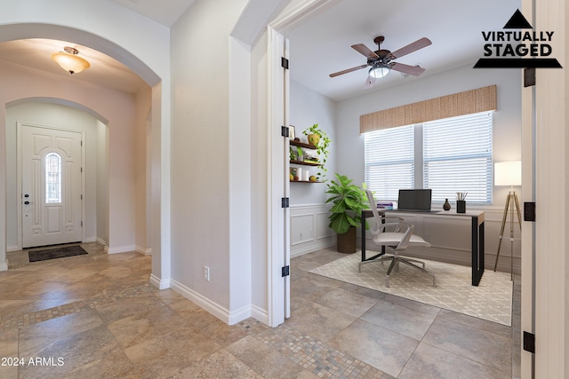 home office with ceiling fan and a wealth of natural light