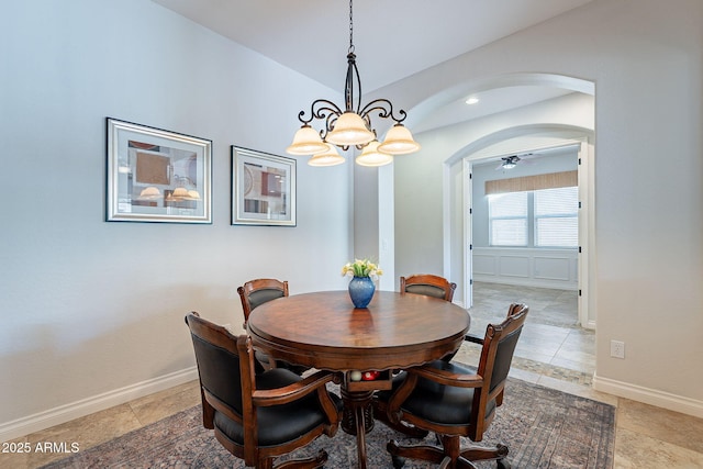 dining area featuring a chandelier