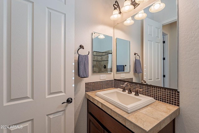 bathroom with vanity and decorative backsplash