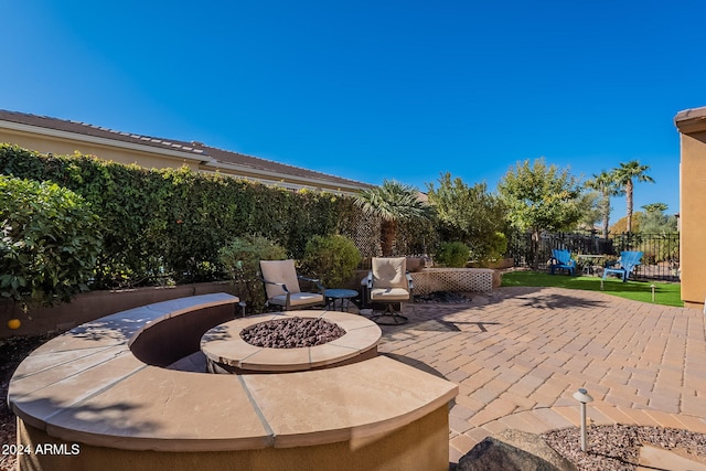 view of patio / terrace featuring a fire pit