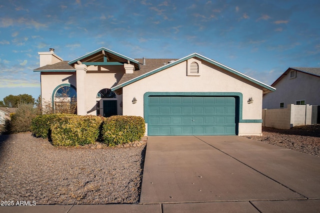 view of front of house with a garage