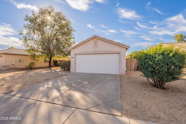 exterior space featuring a garage and an outdoor structure