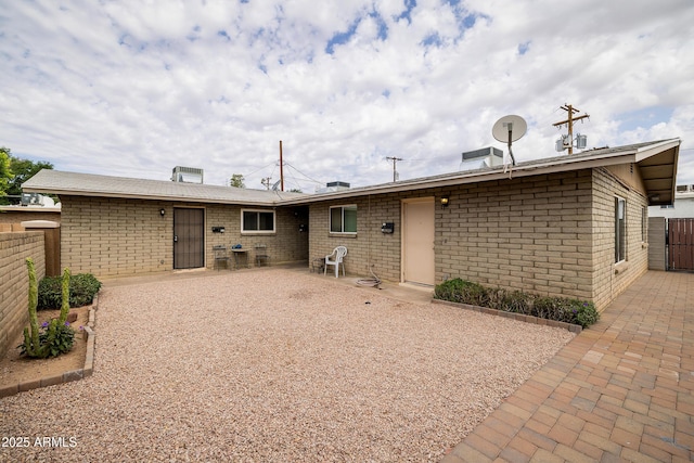 414 E Frost Cir, Mesa, AZ 85203 - back of house with brick siding and a patio