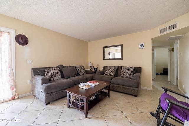414 E Frost Cir, Mesa, AZ 85203 - living room with a textured ceiling and light tile patterned floors