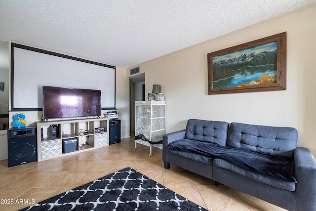 414 E Frost Cir, Mesa, AZ 85203 - tiled living room with a textured ceiling