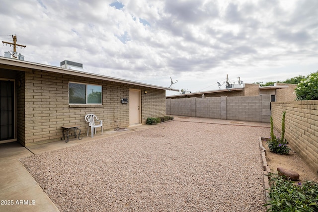 414 E Frost Cir, Mesa, AZ 85203 - fenced backyard featuring a patio