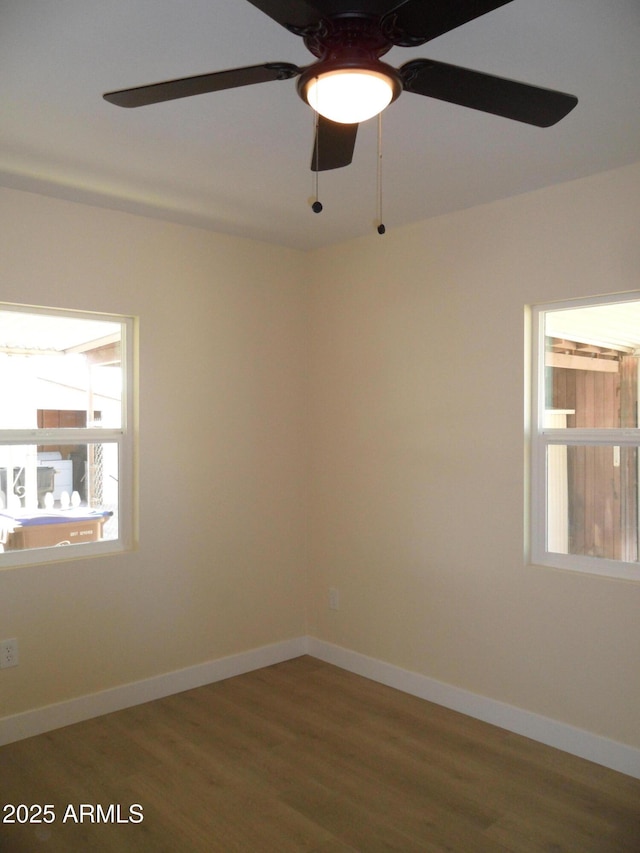 empty room featuring hardwood / wood-style flooring