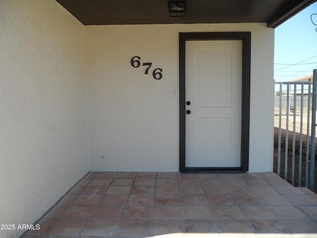 doorway to property featuring a balcony