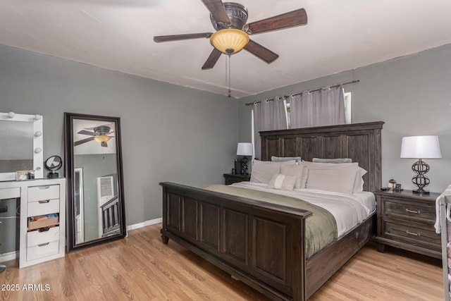 118 E 10th St, Casa Grande, AZ 85122 - bedroom featuring light wood-type flooring and a ceiling fan