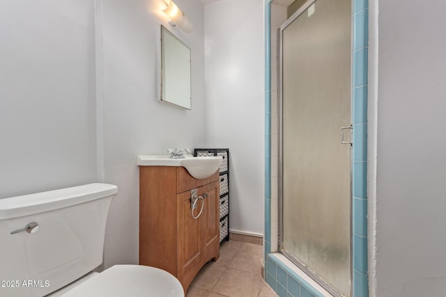 118 E 10th St, Casa Grande, AZ 85122 - bathroom with a stall shower, toilet, tile patterned flooring, and vanity