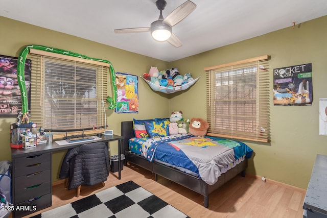 118 E 10th St, Casa Grande, AZ 85122 - bedroom with wood finished floors, ceiling fan, and baseboards