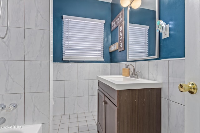 118 E 10th St, Casa Grande, AZ 85122 - bathroom with tile walls, vanity, and wainscoting
