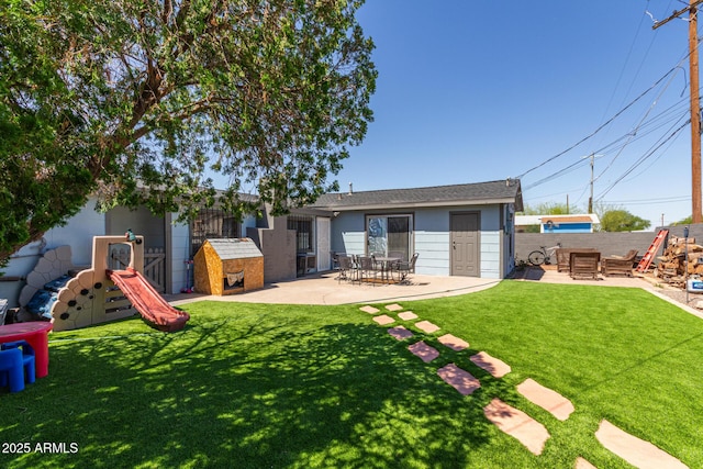 118 E 10th St, Casa Grande, AZ 85122 - back of house with a patio area