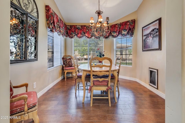 10434 N 44th St N, Phoenix, AZ 85028 - dining area with a chandelier, baseboards, vaulted ceiling, and dark wood-type flooring