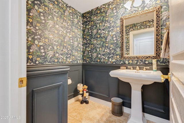 10434 N 44th St N, Phoenix, AZ 85028 - half bathroom featuring tile patterned flooring, wallpapered walls, and wainscoting