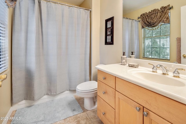 10434 N 44th St N, Phoenix, AZ 85028 - bathroom with vanity, toilet, tile patterned floors, and shower / tub combo with curtain