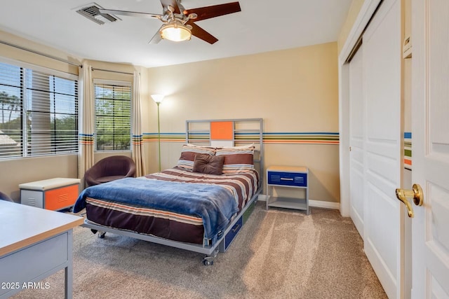 10434 N 44th St N, Phoenix, AZ 85028 - bedroom with carpet flooring, a closet, and a ceiling fan