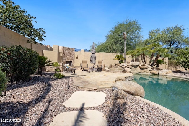 10434 N 44th St N, Phoenix, AZ 85028 - view of pool featuring a patio, a fenced backyard, and an outdoor fire pit