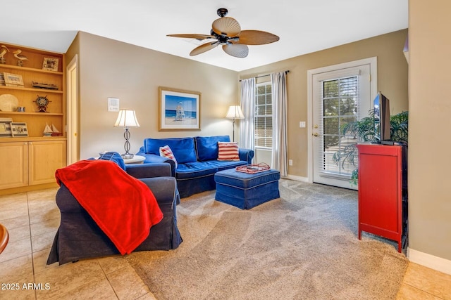 10434 N 44th St N, Phoenix, AZ 85028 - tiled living room with ceiling fan and baseboards