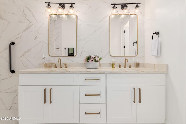 full bath with double vanity and a sink