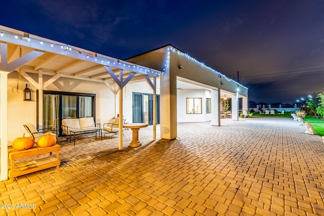 view of patio at twilight