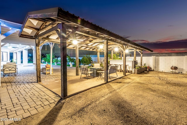 view of patio / terrace featuring fence and a pergola