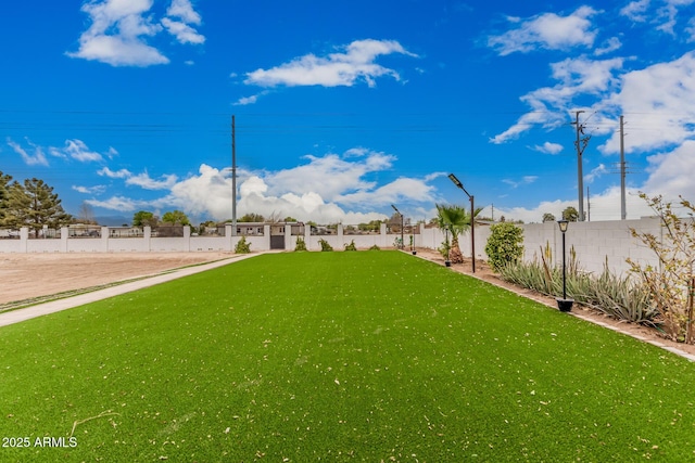 exterior space featuring a fenced backyard