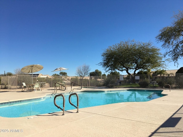 view of pool featuring a patio area