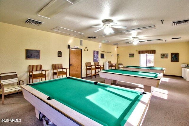 game room with carpet, billiards, ceiling fan, and a textured ceiling