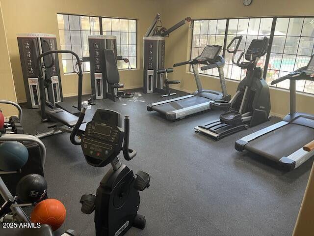 7575 E Indian Bend Rd Unit 1100, Scottsdale, AZ 85250 - gym featuring baseboards