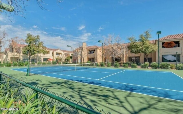 7575 E Indian Bend Rd Unit 1100, Scottsdale, AZ 85250 - view of tennis court featuring fence and a residential view