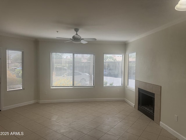 7575 E Indian Bend Rd Unit 1100, Scottsdale, AZ 85250 - unfurnished living room featuring light tile patterned floors, crown molding, ceiling fan, healthy amount of natural light, and a tile fireplace