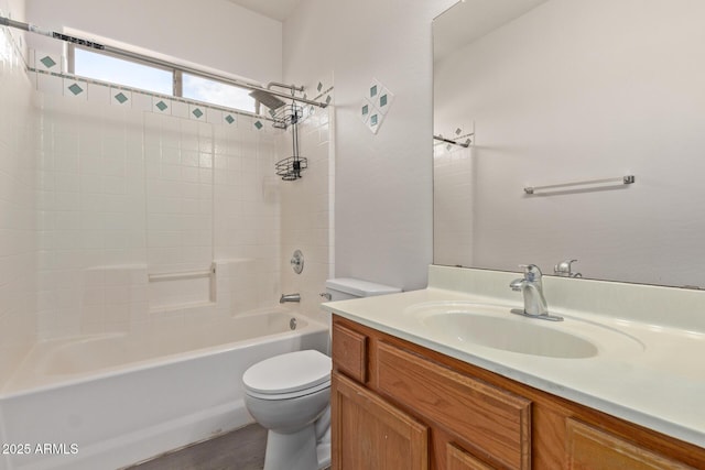 bathroom with toilet,  shower combination, and vanity