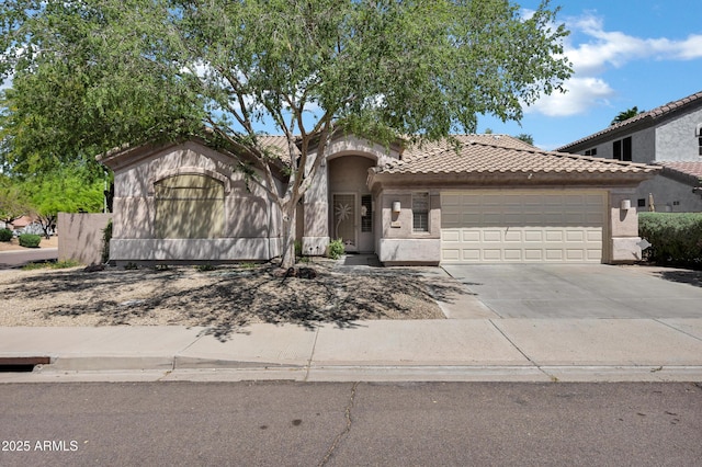 2260 E Binner Dr, Chandler, AZ 85225 - view of front facade featuring stucco siding, driveway, a tiled roof, and a garage