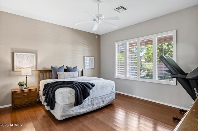2260 E Binner Dr, Chandler, AZ 85225 - bedroom featuring baseboards, wood finished floors, visible vents, and a ceiling fan