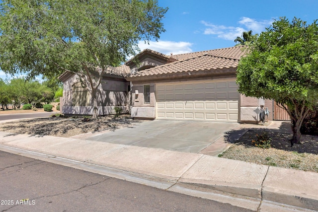 2260 E Binner Dr, Chandler, AZ 85225 - view of front facade with stucco siding, a tile roof, driveway, and a garage