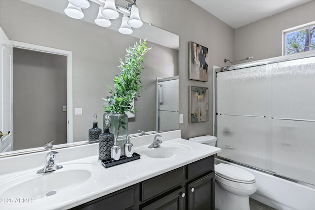 2260 E Binner Dr, Chandler, AZ 85225 - bathroom featuring enclosed tub / shower combo, toilet, a sink, and double vanity