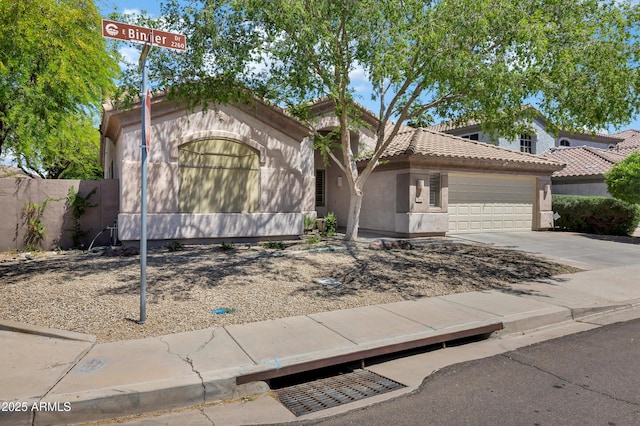 2260 E Binner Dr, Chandler, AZ 85225 - view of front of property with a tile roof, driveway, fence, a garage, and stucco siding