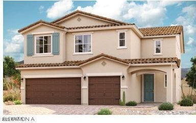 mediterranean / spanish house with a garage, driveway, a tiled roof, and stucco siding