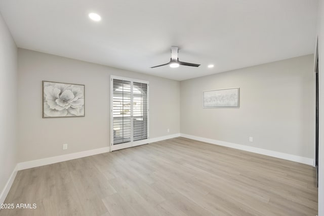 unfurnished room with ceiling fan and light hardwood / wood-style flooring