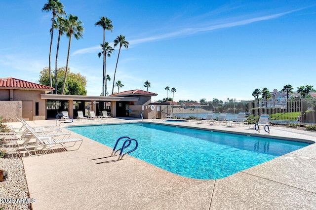 view of swimming pool featuring a patio