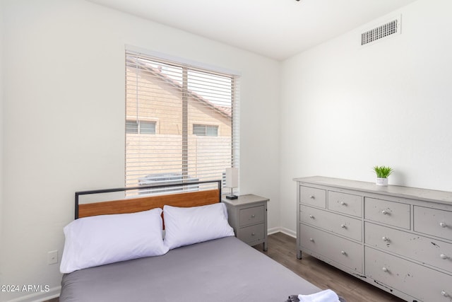 bedroom featuring hardwood / wood-style flooring