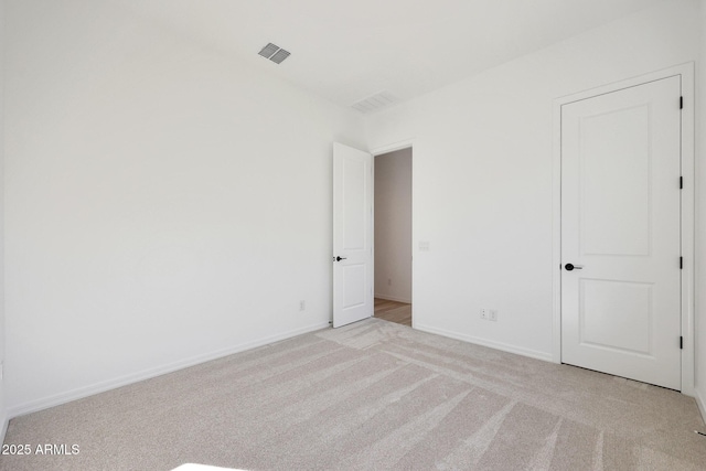 28266 N 134th Dr, Peoria, AZ 85383 - empty room with visible vents, light colored carpet, and baseboards