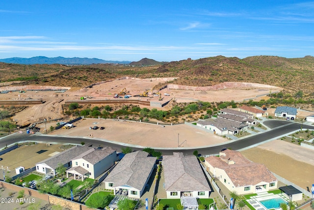 drone / aerial view featuring a mountain view